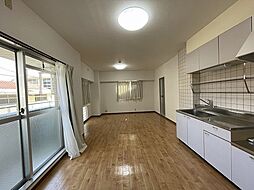 椿ガーデンIII 2階1LDKのリビング/ダイニング