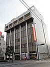 銀行「栃木信用金庫 江曽島支店まで1049m」