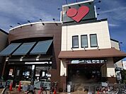 マルヤス 登美の里店 徒歩9分。 670m