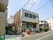 足立竹の塚郵便局 徒歩5分。郵便局 370m