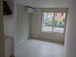 メリディアン川平　壱番館 103 1階1LDKのリビング/ダイニング