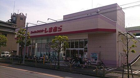 ファッションセンターしまむら加平店 徒歩9分。 700m