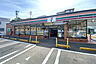 周辺：セブンイレブン塩釜庚塚店　徒歩14分