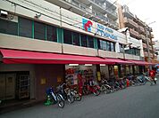 万代塚本店 438m