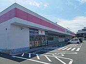 その他「ココカラファインまで850m」