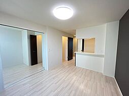 モイス・シャーム熊取 203 2階2LDKのリビング/ダイニング