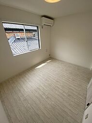 ルフトワン三葛 2階1Kの寝室