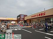 ファッションセンターしまむら登戸店 徒歩16分。ショッピングセンター 1230m