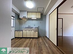 京王線 調布駅 徒歩5分の賃貸マンション 1階2DKのリビング/ダイニング