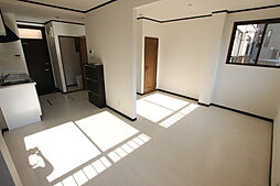 メゾン菊富士西志津 106 1階ワンルームのリビング/ダイニング