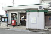 向日森本郵便局まで110m