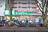周辺：業務スーパー新松戸店まで1131m