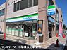 周辺：ファミリーマート稲城長沼駅前店まで387m
