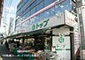 周辺：トップパルケ久地店まで1034m