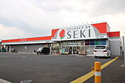 ドラッグストアセキ鶴ヶ島店まで319m