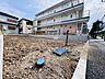 その他：周辺の建物が見える更地の物件