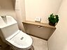 トイレ：シンプルで清潔感のあるトイレ空間