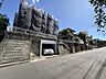 外観：石垣と門扉のある戸建て外観