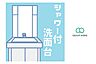 洗面：【パウダールーム】朝を優雅に過ごせる収納豊富な広々空間。観音開きの洗面台下は、車椅子でもスムーズにアプローチできるよう足元をオープンにした優しい設計です。