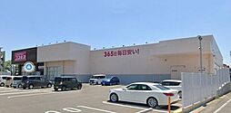 ディスカウントドラッグコスモス城ケ崎店まで591m