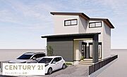 シンプルで洗練された外観が特徴的です。ガルバリウム鋼板の屋根とホワイト系の外壁がすっきりとした印象を与えます。2台分の駐車スペースもしっかり確保されています。