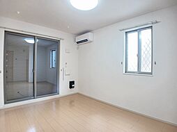 ドマーニ　Ａ 104 1階1SKのリビング/ダイニング