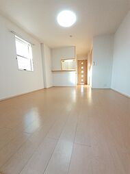 スモ−ルウッズタウンＴＯＭＯI 103 1階ワンルームのリビング/ダイニング