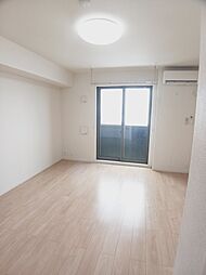 ベルサピーV 103 1階ワンルームのリビング/ダイニング