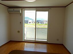 トレジャーガーデンII 203 2階1LDKのリビング/ダイニング