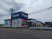 ノジマ電機　巻店まで822ｍ