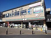 【コンビニエンスストア】セブンイレブン越谷大袋駅西口店まで450ｍ