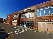TSUTAYA いまじん白揚まで1306ｍ