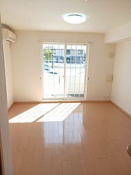 シャン・ド・フルール　タマキ 101 1階ワンルームのリビング/ダイニング