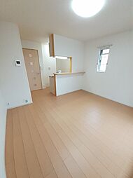 スモ−ルウッズタウンＴＯＭＯI 201 2階1LDKのリビング/ダイニング