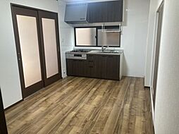 セジュールいくし　C棟 C102 1階4DKのリビング/ダイニング