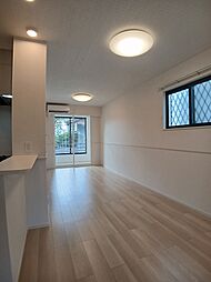 プレミアム27番館 101 1階1LDKのリビング/ダイニング