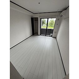 アクシィヴVIII 102 1階1Kのリビング/ダイニング