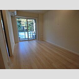 グランフォルトゥーナ羽根木ヒルサイド 102 1階1LDKのリビング/ダイニング