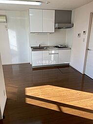 ウィスタリア・ガーデン　AB B101 1階1LDKのリビング/ダイニング