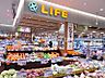 周辺：【スーパー】ライフ tonarie大和高田店まで509ｍ