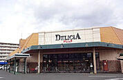 【スーパー】デリシア 石芝店まで450ｍ