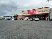 【生活雑貨店】ダイソーノースランド店まで989ｍ
