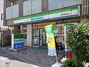 【コンビニエンスストア】ファミリーマート上野毛駅前店まで946ｍ