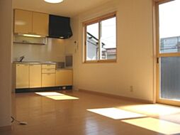 近鉄湯の山線 伊勢松本駅 徒歩3分の賃貸アパート 2階2LDKのリビング/ダイニング