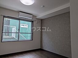 イーストヒルズI 302 3階ワンルームのリビング/ダイニング