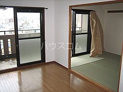 名古屋市営鶴舞線 浄心駅 徒歩14分の賃貸マンション 4階3LDKのリビング/ダイニング