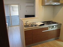 アール・オッツ 103 1階ワンルームのリビング/ダイニング