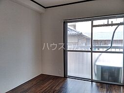 第69プロスパービル 202 2階2Kの寝室