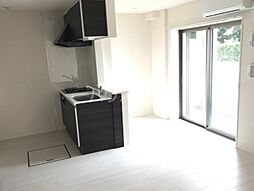 多摩都市モノレール 柴崎体育館駅 徒歩6分の賃貸マンション 1階1LDKのリビング/ダイニング