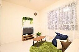 我寧舎（ガネーシャ） 105 1階1Kのリビング/ダイニング